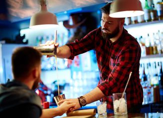 Man falling off his stool in a bar Jokes Times